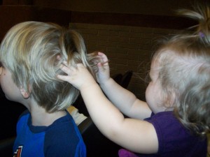 100_0402 Lexi playing with Zander's hair
