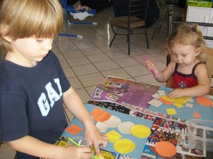 100_2624 Zander and Lexi glueing shapes.